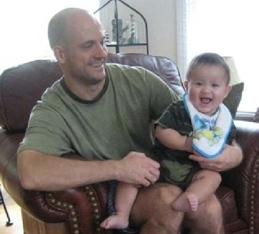 Shay Black, son of Mike Black and Jo Reed Leach, with his younger son, Michael nine months.